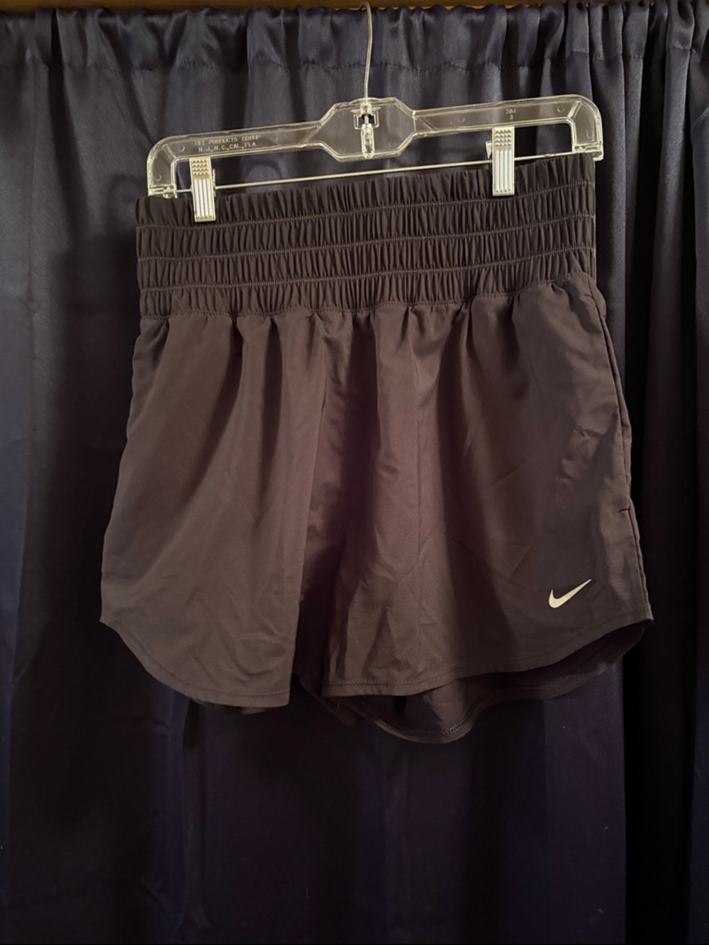 Women’s Nike DRI-FIT black running shorts, size Medium